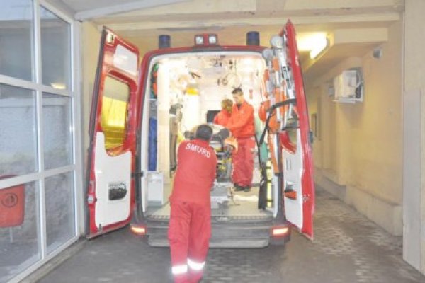 A turnat spirt pe ea şi şi-a dat foc